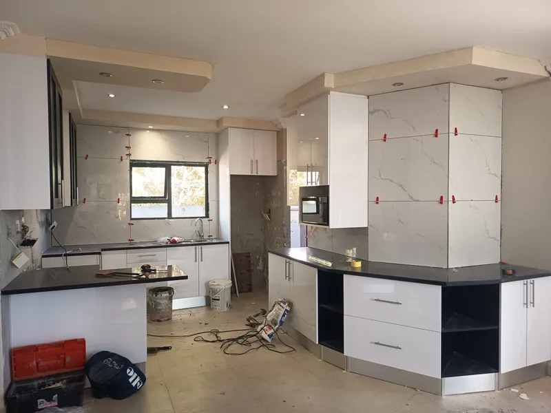 Kitchen renovation project with custom cabinetry and tiling in Cape Town